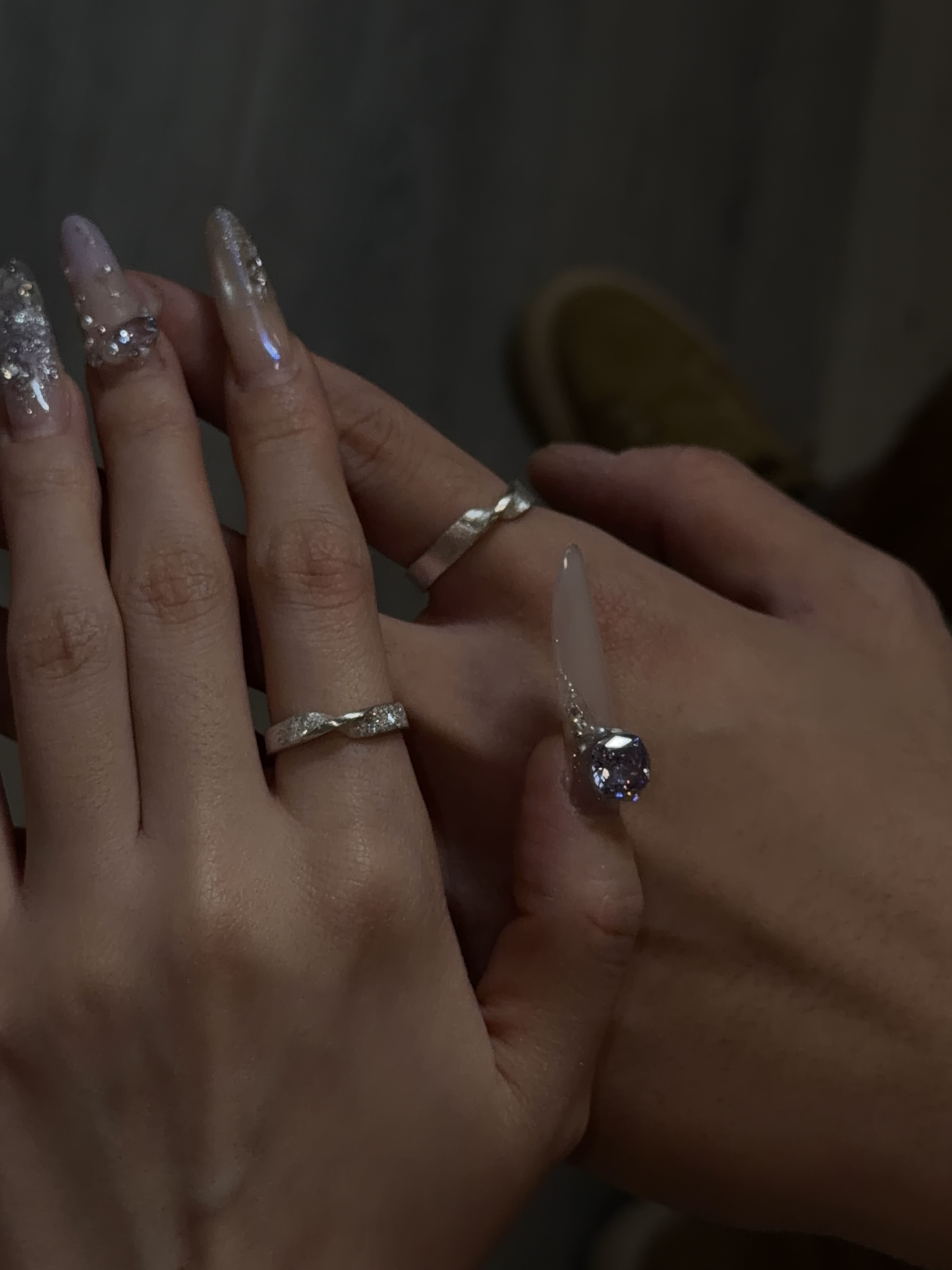 Couple wearing handmade silver rings